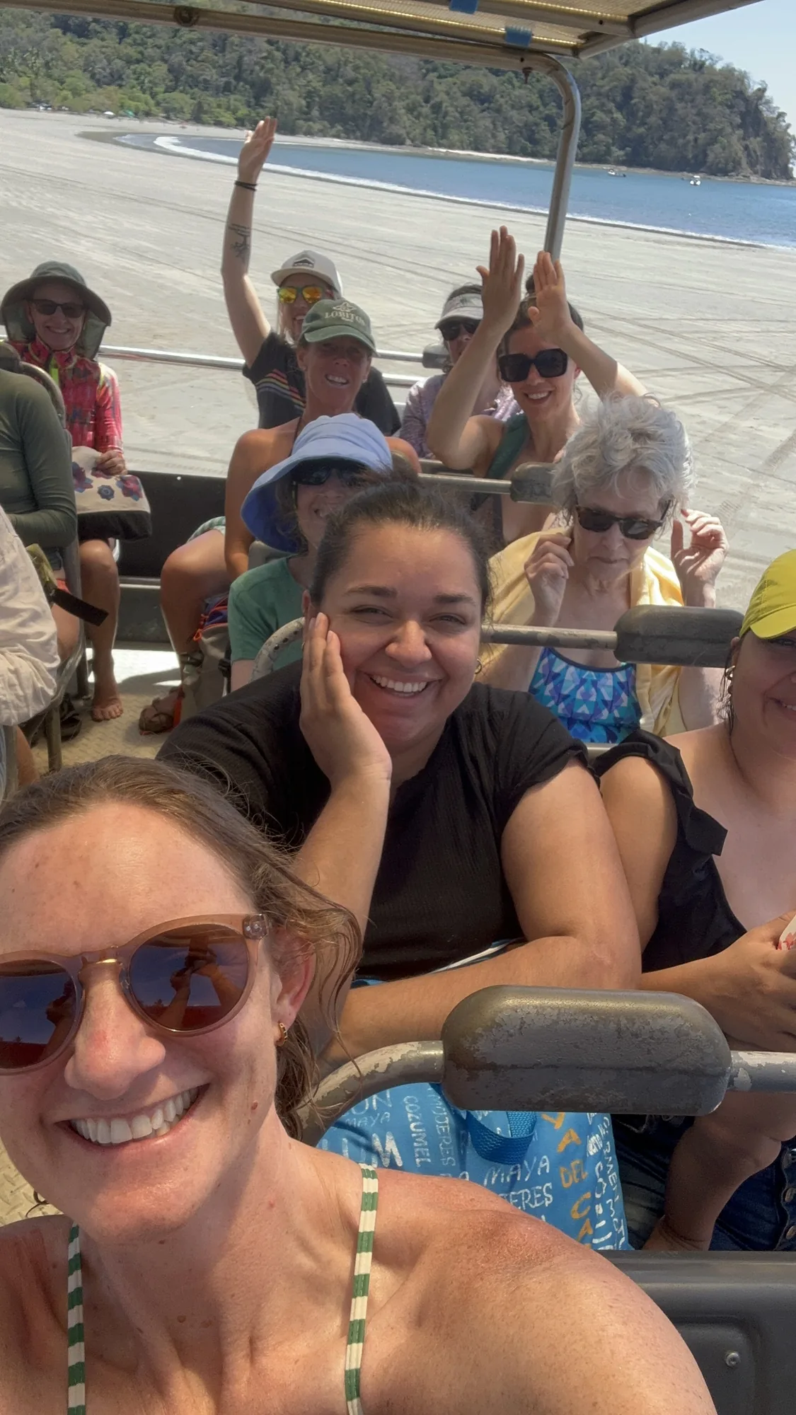 Away Retreats group riding a beach tour vehicle in Costa Rica