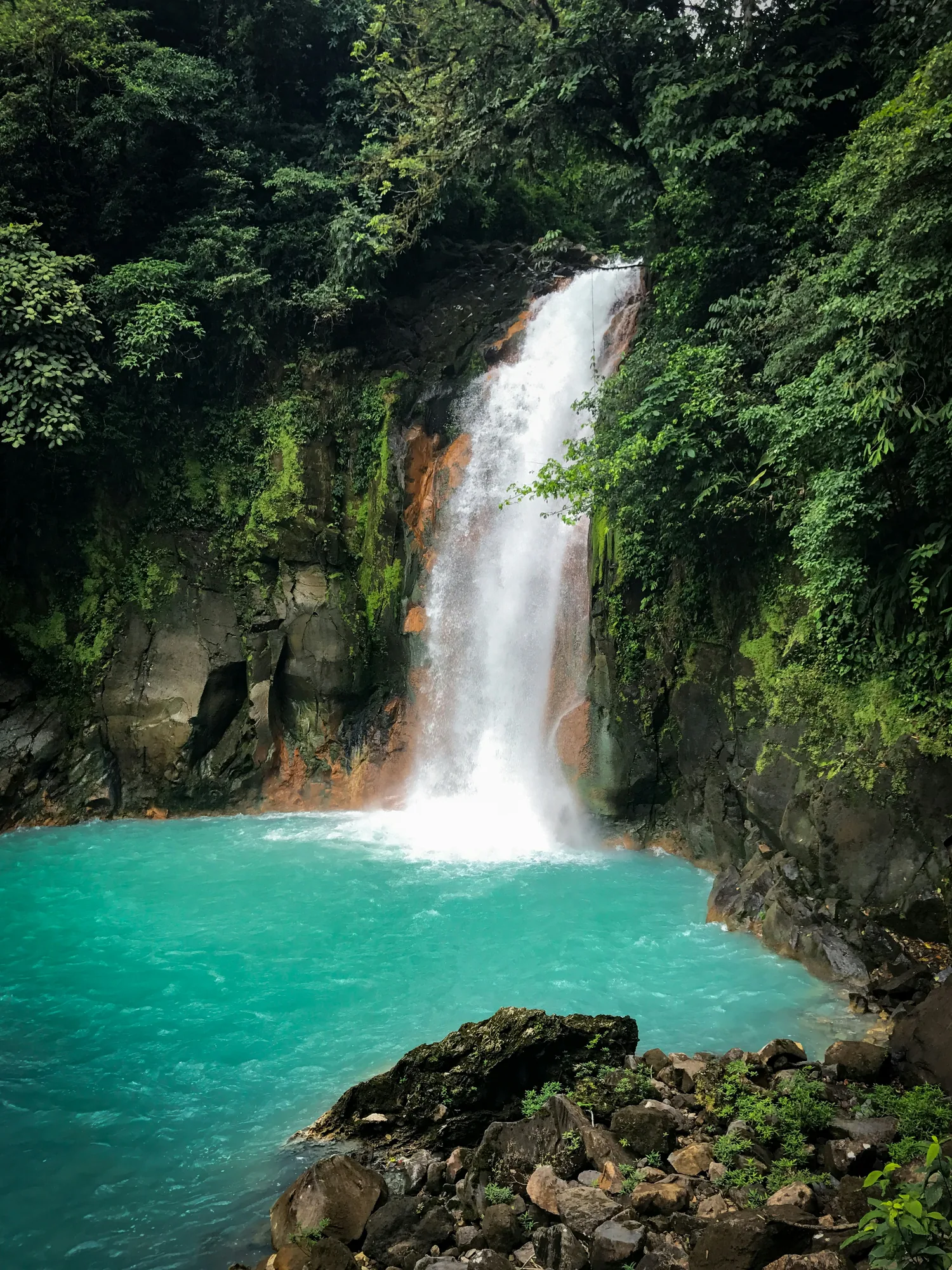 Rio Celeste waterfall and turquoise pool in Costa Rica, a highlight of our adventure retreats